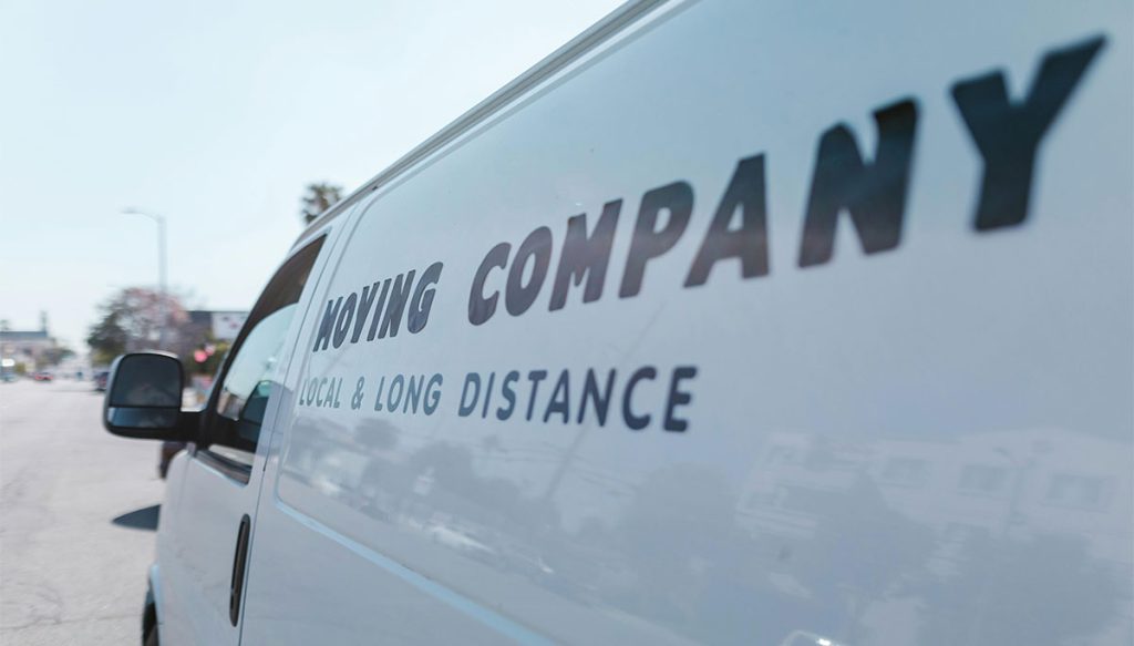 van with moving company text