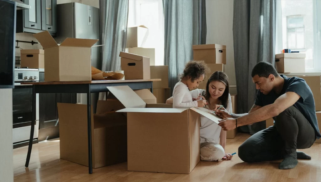 family packing boxes