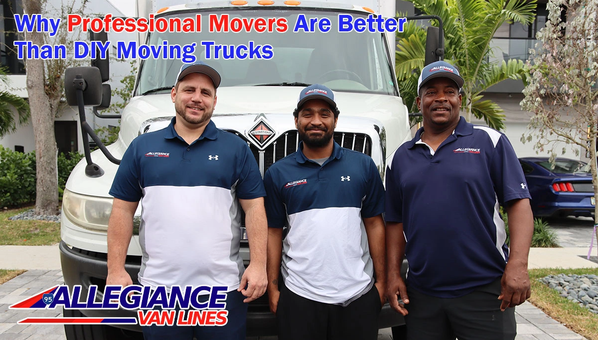 PRofessional movers smiling infront of moving truck