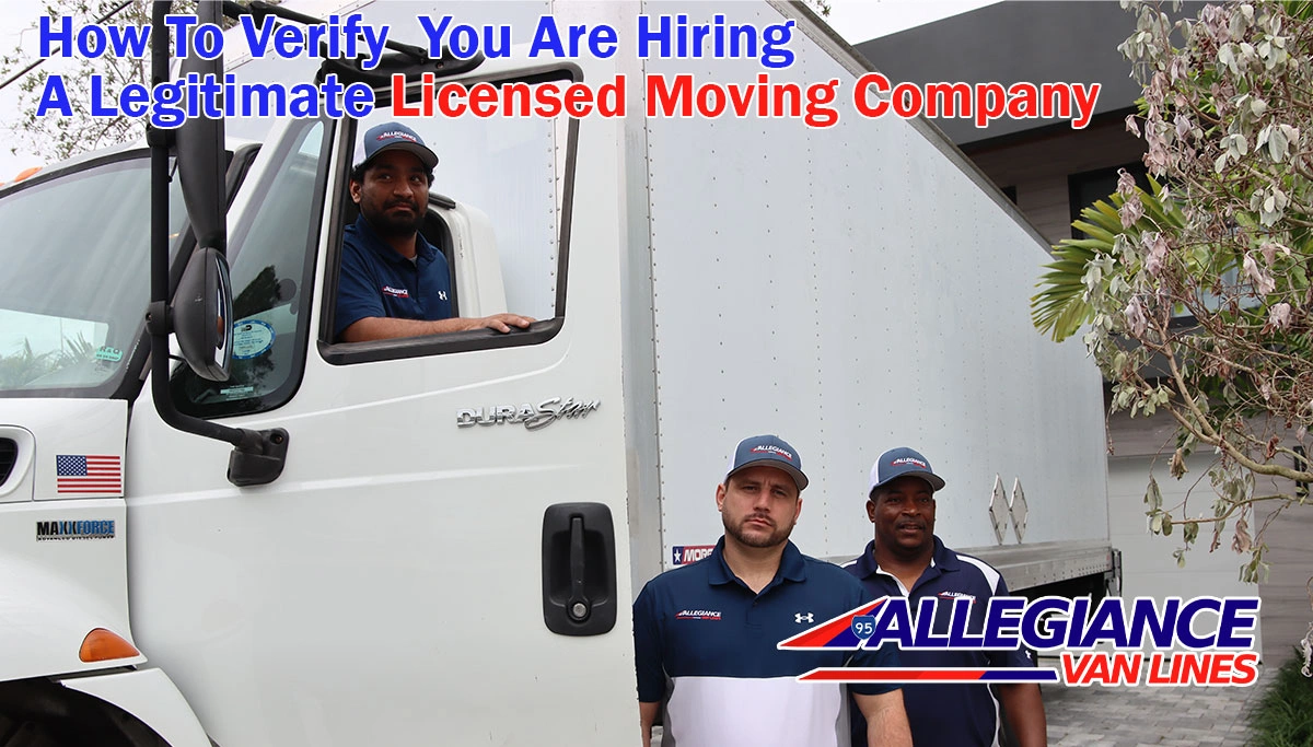 movers standing next to their moving truck