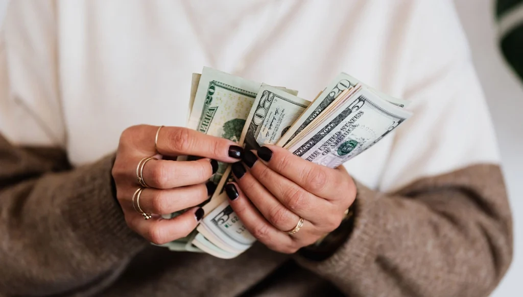woman counting cash